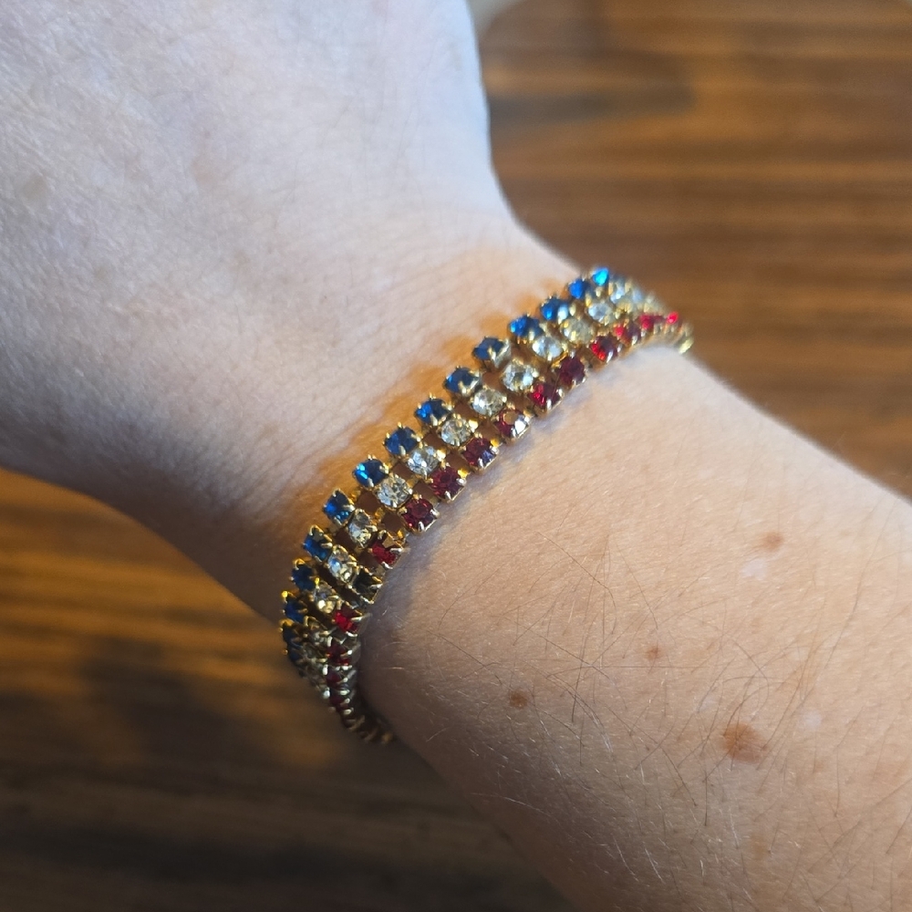 Gold Tennis Bracelet with Red, White, and Blue Stones